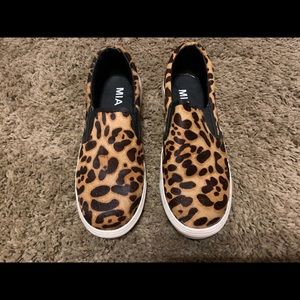 Leopard skin slip-on shoes